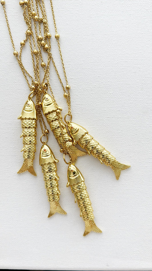 Collana sardina móvil