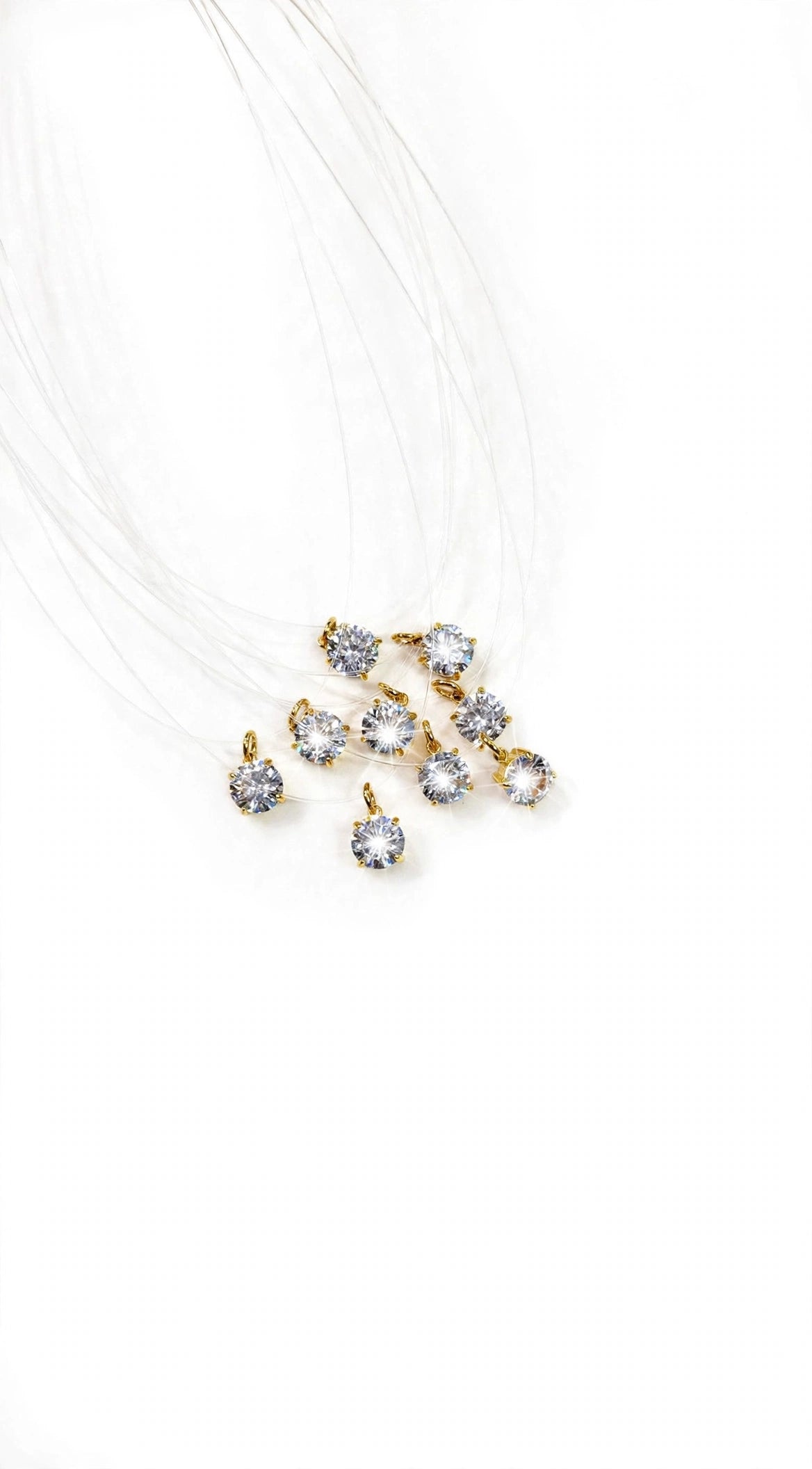 Collana punto luce filo invisibile